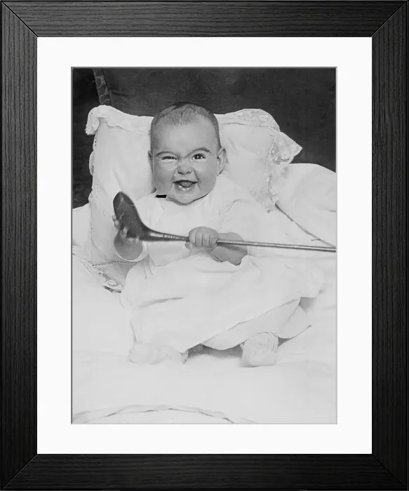 Framed Print : Baby Girl Holding a Golf Club Framed Print : Baby Girl Holding a Golf Club