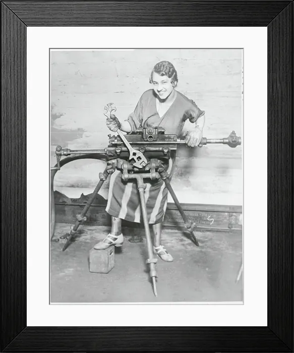 Framed Print : Female Engineering Student with Machinery Framed Print : Female Engineering Student with Machinery