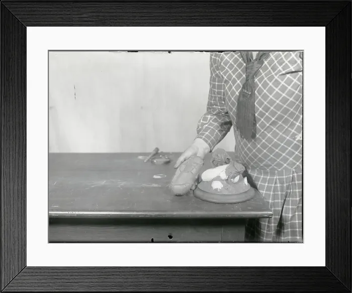 Framed Print : Fake Dinosaur Egg Being Modelled