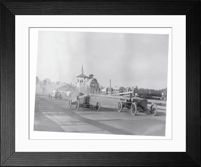 Framed Print : Men Competing in an Auto Race Framed Print : Men Competing in an Auto Race