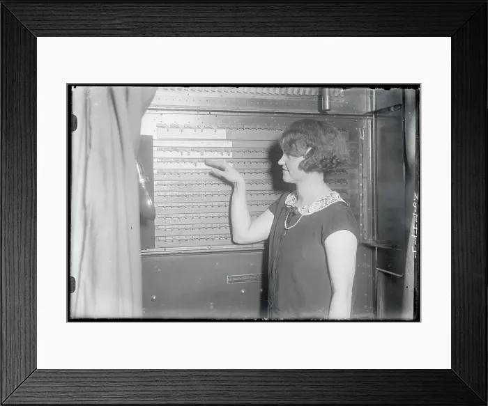 Framed Print : Woman Demonstrating a Voting Machine Framed Print : Woman Demonstrating a Voting Machine