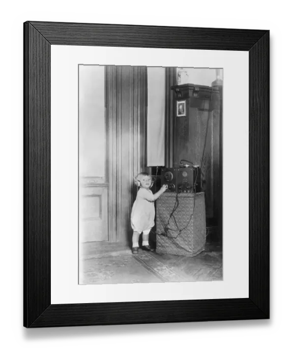 Framed Print : Child Listening to a Radio Framed Print : Child Listening to a Radio