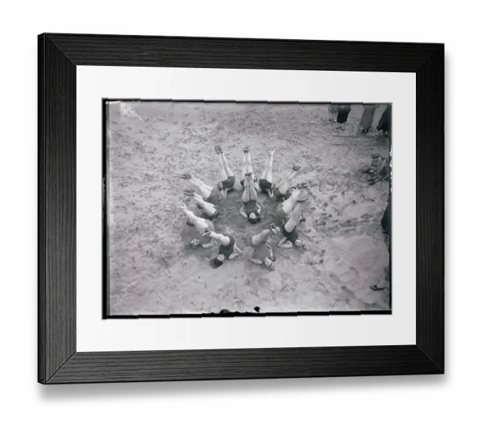 Framed Print : Girls Forming Star in Sand