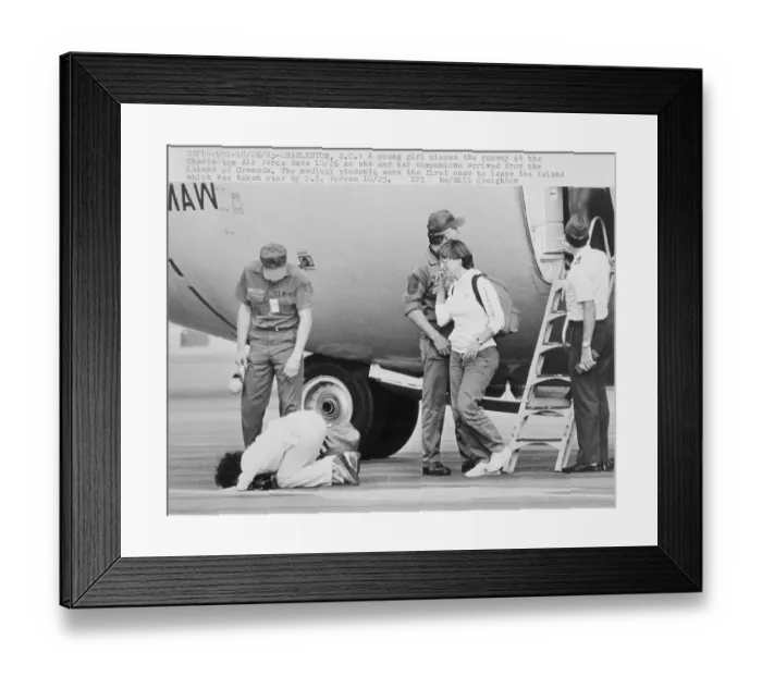 Framed Print : Grenadian Girl Stooping to Kiss U. S. Runway Framed Print : Grenadian Girl Stooping to Kiss U. S. Runway