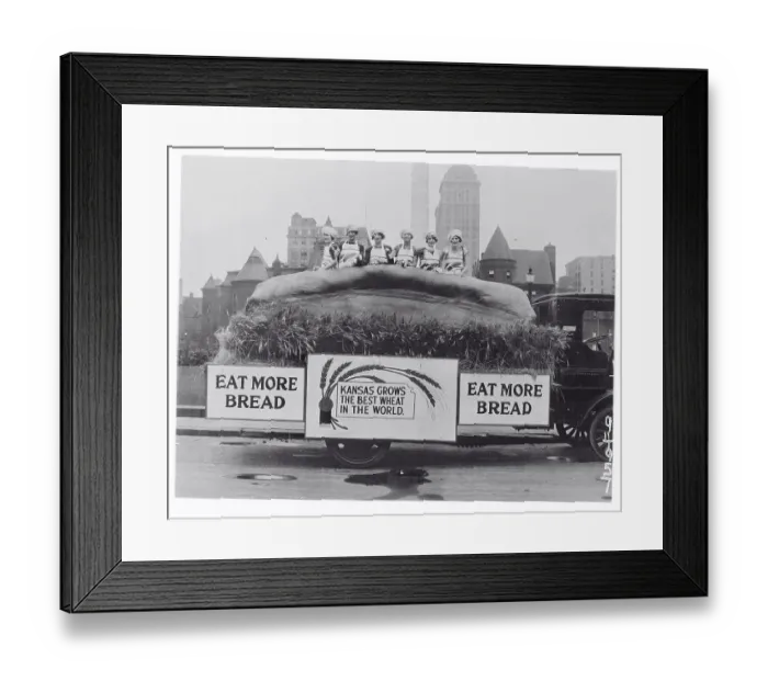 Framed Print : Women Standing in a Large Loaf of Bread Framed Print : Women Standing in a Large Loaf of Bread