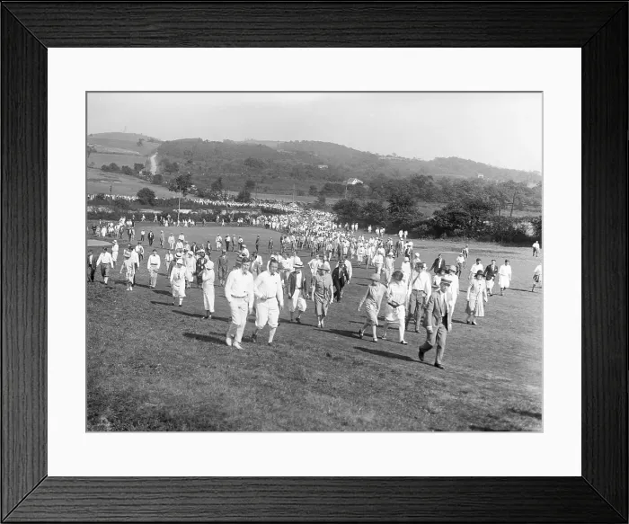 Framed Print : Crowd in Long Line Walking Over Golfcourse Framed Print : Crowd in Long Line Walking Over Golfcourse
