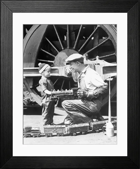 Framed Print : Locomotive Engineer Conversing with Young Boy
