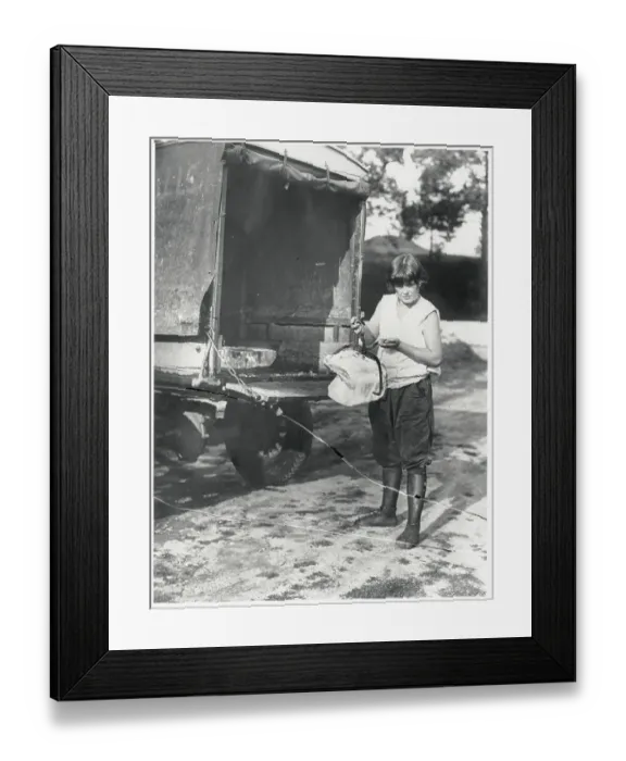 Framed Print : Woman Holding Block of Ice Framed Print : Woman Holding Block of Ice