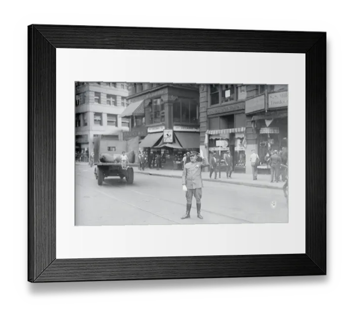 Framed Print : Policeman Directing City Traffic Framed Print : Policeman Directing City Traffic