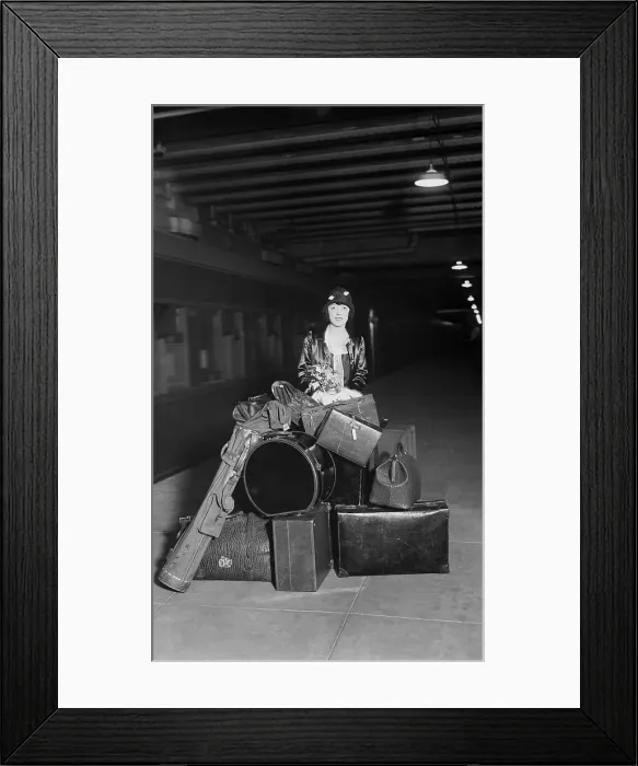 Framed Print : Mabel Normand with Pile of Luggage Framed Print : Mabel Normand with Pile of Luggage