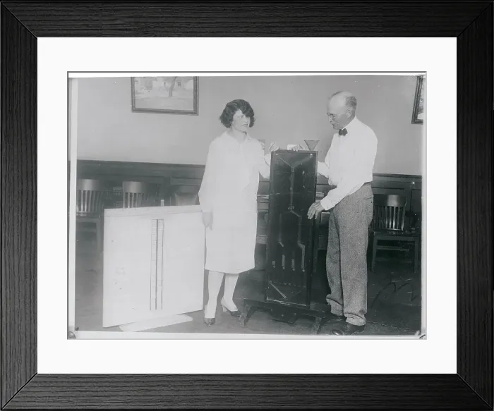 Framed Print : Man Demonstrating Heredity Machine Framed Print : Man Demonstrating Heredity Machine