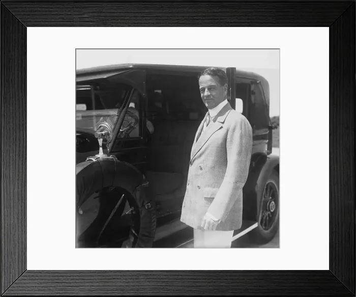 Framed Print : William K. Vanderbilt II Posing Next to a Car Framed Print : William K. Vanderbilt II Posing Next to a Car
