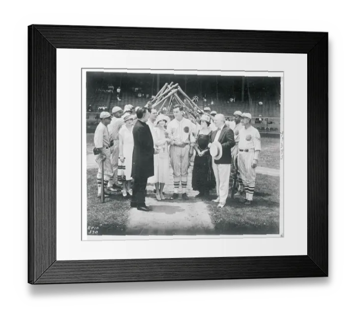 Framed Print : Bride and Groom Passing Under Arched Bats Framed Print : Bride and Groom Passing Under Arched Bats