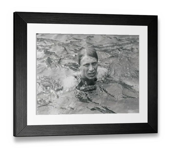 Framed Print : Swimmer Surfacing In Water Framed Print : Swimmer Surfacing In Water