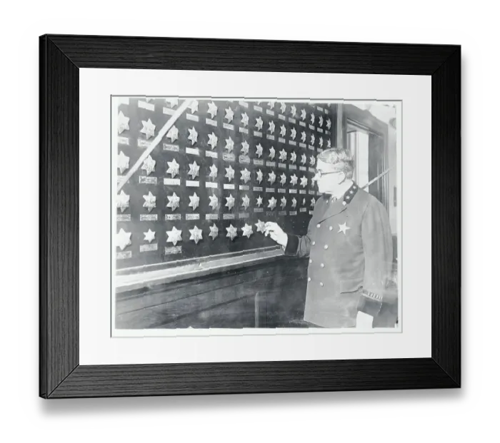 Framed Print : Police Chief Holding Badge Framed Print : Police Chief Holding Badge