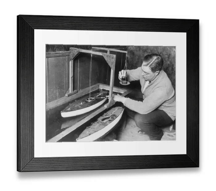 Framed Print : Model Yacht Designer Taking Waterline Reading Framed Print : Model Yacht Designer Taking Waterline Reading