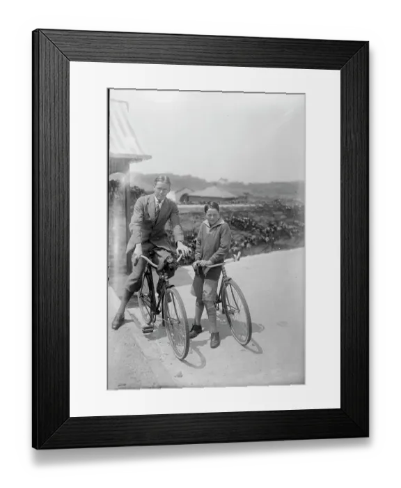 Framed Print : Two People Posing on Their Bicycles Framed Print : Two People Posing on Their Bicycles