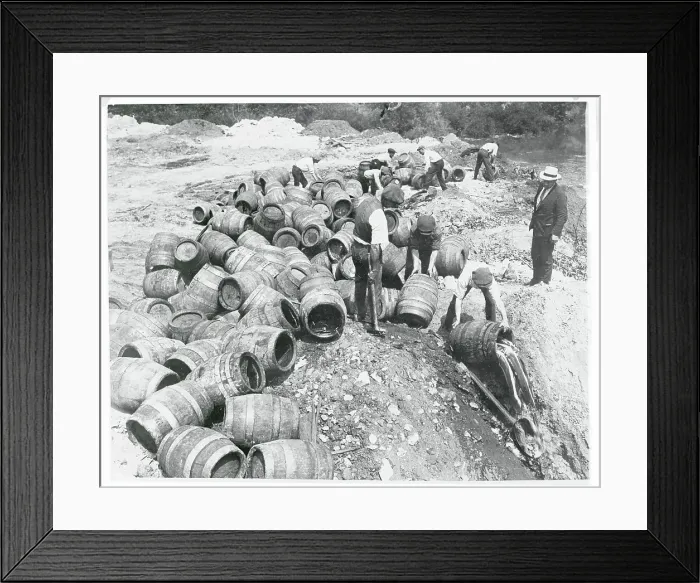 Framed Print : Workers Spilling Seized Beer Framed Print : Workers Spilling Seized Beer