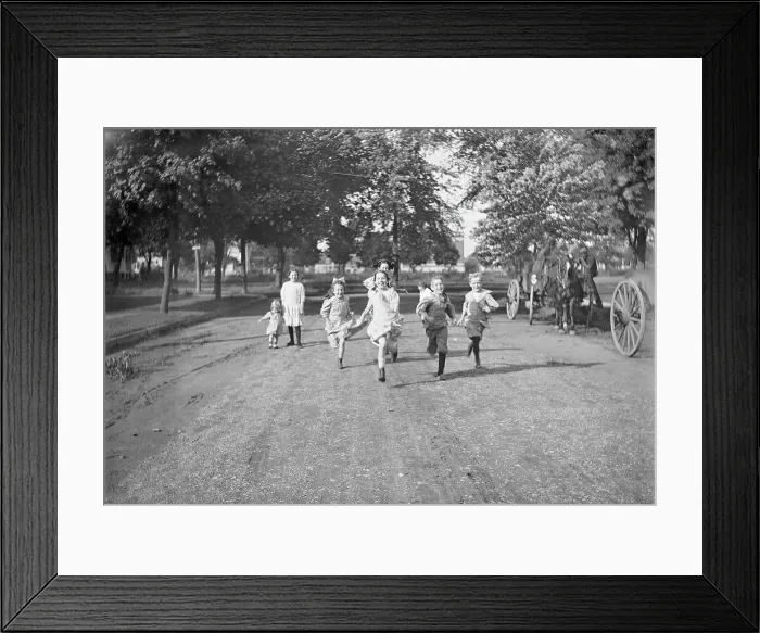 Framed Print : Children (3-12 years) running dirt road. 1925
