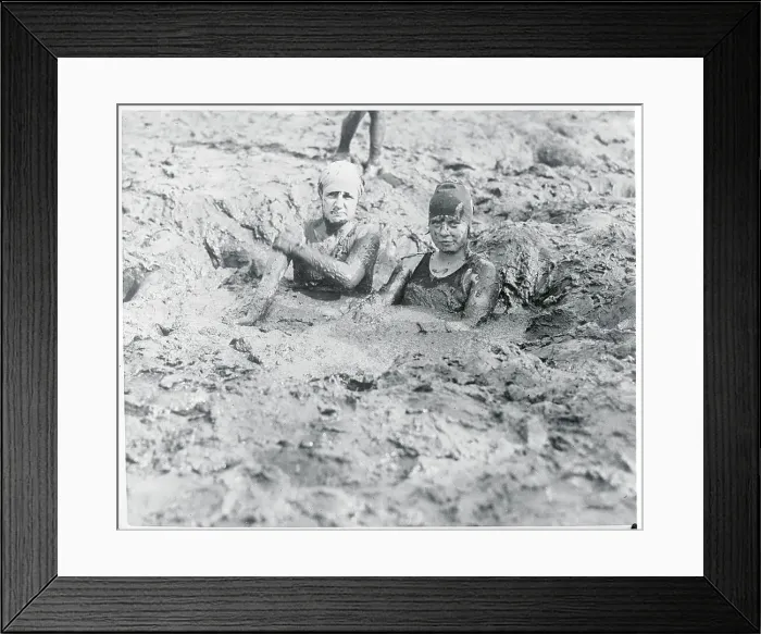 Framed Print : Women Relaxing in Mud Framed Print : Women Relaxing in Mud