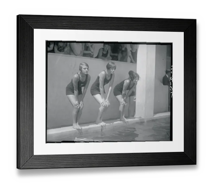 Framed Print : Female Swimmers Preparing to Dive into the Pool Framed Print : Female Swimmers Preparing to Dive into the Pool