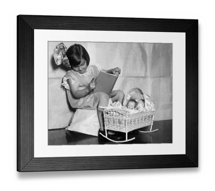Framed Print : Girl Telling Dollies a Bedtime Story Framed Print : Girl Telling Dollies a Bedtime Story