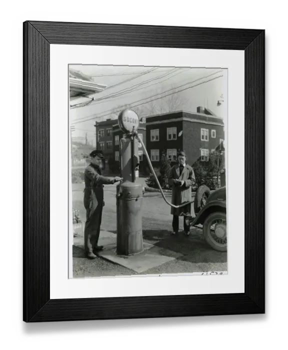 Framed Print : Man Pumping Gas Framed Print : Man Pumping Gas