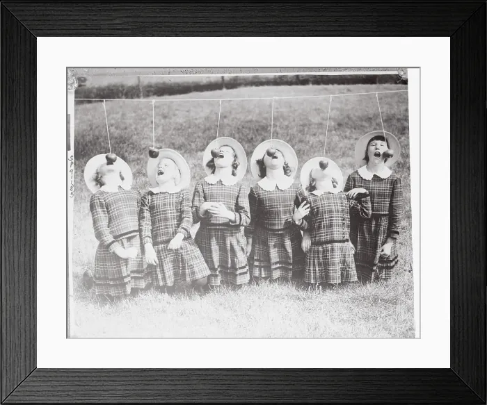 Framed Print : Children Competing in a Bob Apple Contest Framed Print : Children Competing in a Bob Apple Contest
