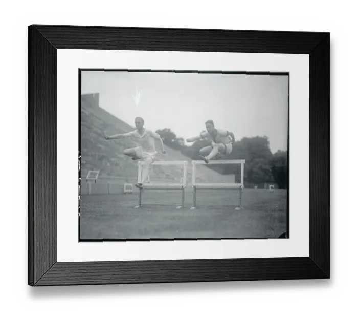 Framed Print : Athletes Practicing Their Hurdling Framed Print : Athletes Practicing Their Hurdling