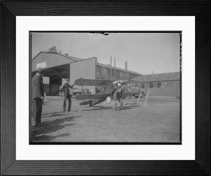 Framed Print : Pilot Posing with His Plane Framed Print : Pilot Posing with His Plane