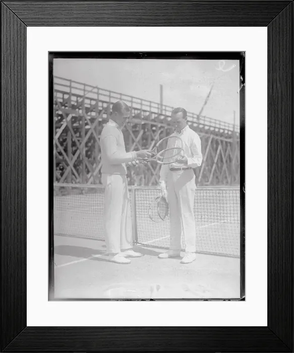 Framed Print : Tennis Players Checking Their Racquets
