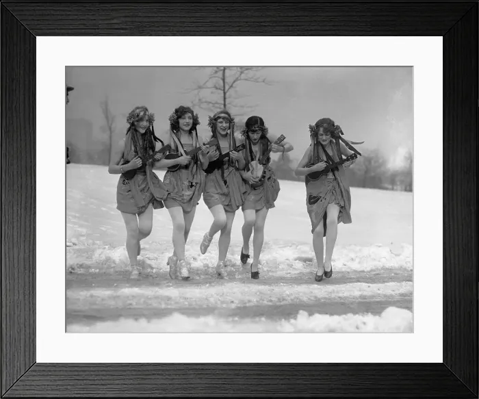 Framed Print : Five women playing ukuleles in snow Framed Print : Five women playing ukuleles in snow