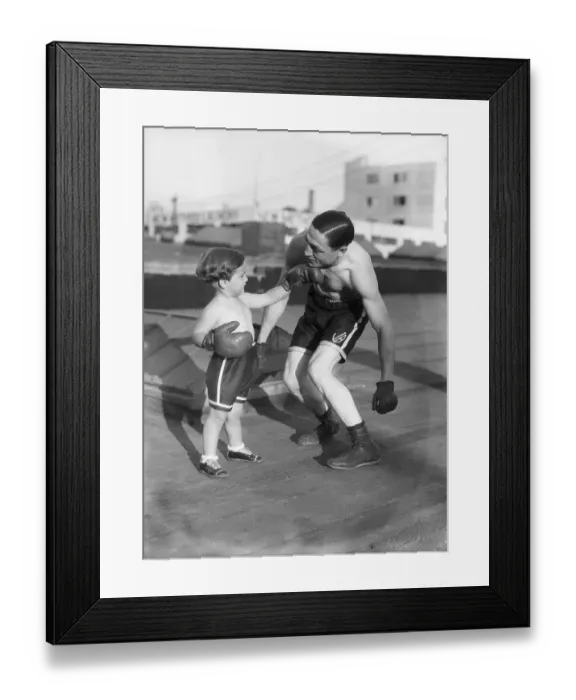 Framed Print : Son Giving Boxer Father KO Punch