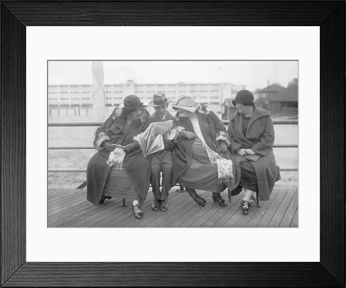 Framed Print : Overweight sisters crowding man on bench Framed Print : Overweight sisters crowding man on bench