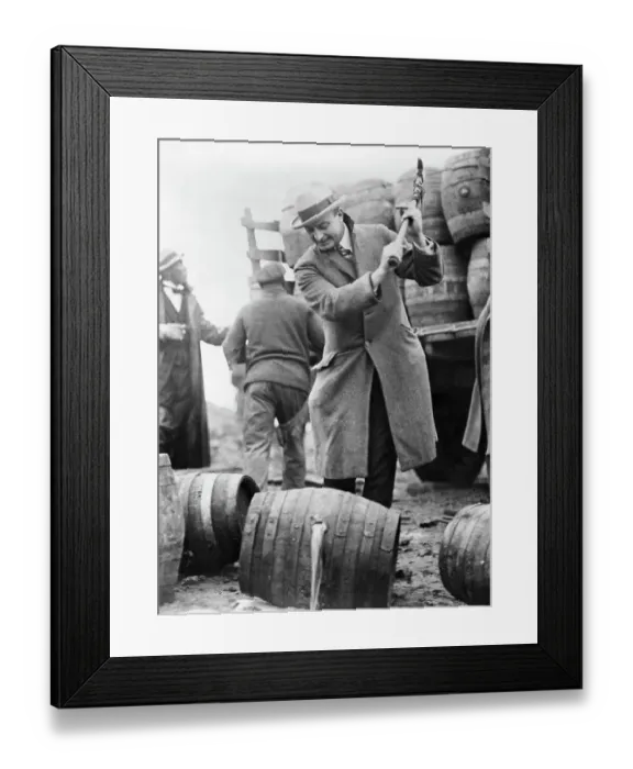 Framed Print : Man Smashing Keg of Beer Framed Print : Man Smashing Keg of Beer