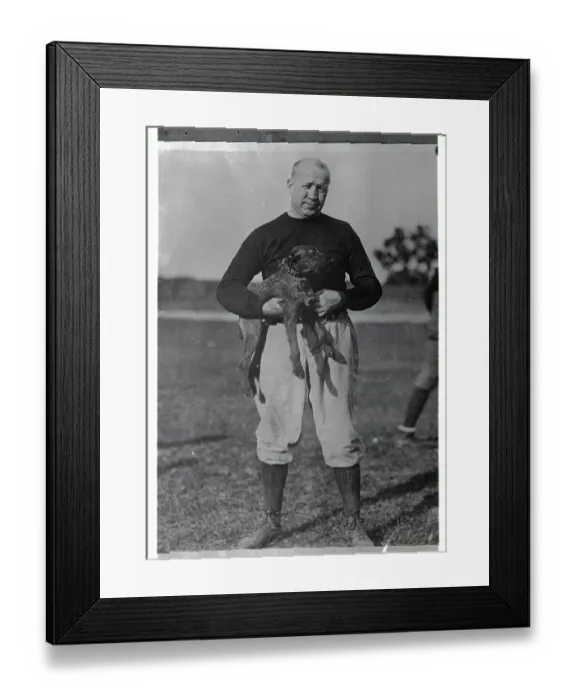 Framed Print : Notre Dame Coach Knute Rockne Holding Dog Framed Print : Notre Dame Coach Knute Rockne Holding Dog