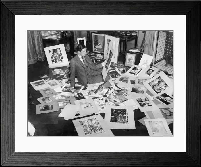 Framed Print : Cecil Beaton On Floor Choosing Pictures Framed Print : Cecil Beaton On Floor Choosing Pictures