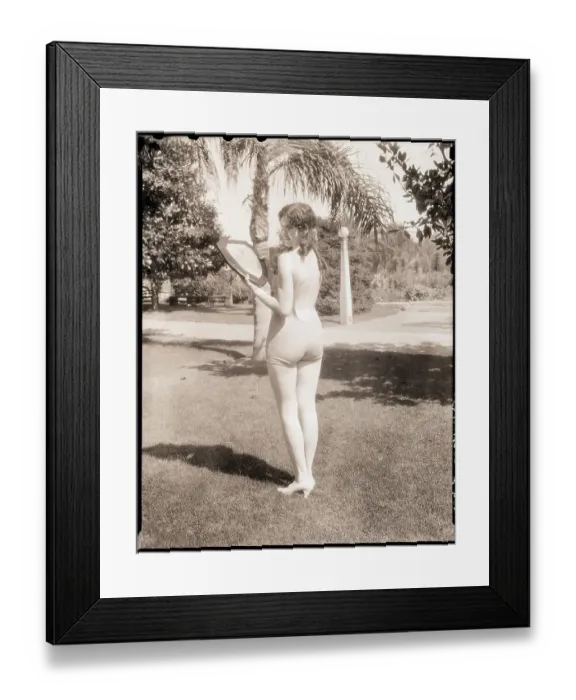 Framed Print : Woman in Bathing Suit Holding Plaque Framed Print : Woman in Bathing Suit Holding Plaque