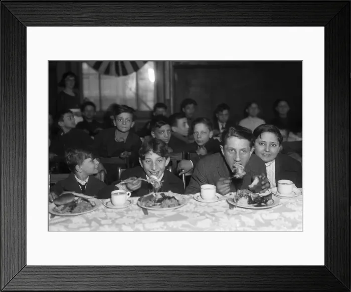 Framed Print : Group of children (6-15) eating lunch Framed Print : Group of children (6-15) eating lunch