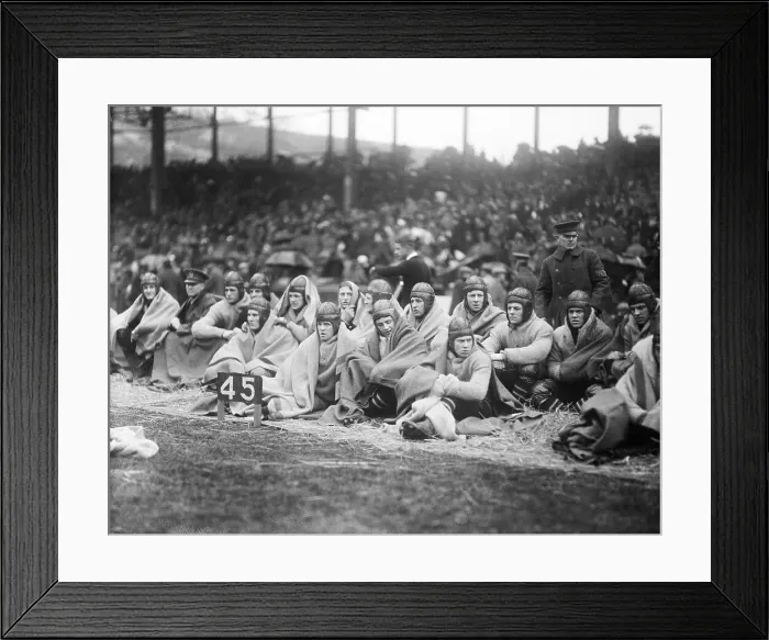 Framed Print : Navy Football Team Resting on Field Framed Print : Navy Football Team Resting on Field