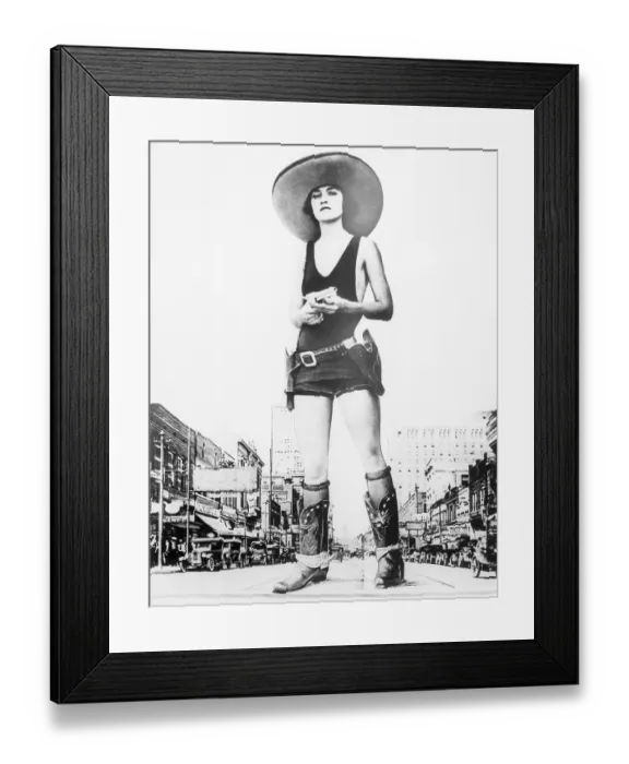 Framed Print : Woman Dressed in Cowgirl Costume with a Gun Framed Print : Woman Dressed in Cowgirl Costume with a Gun