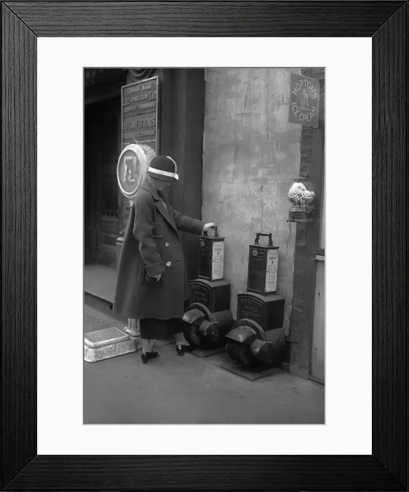 Framed Print : Woman polishing shoes on street Framed Print : Woman polishing shoes on street