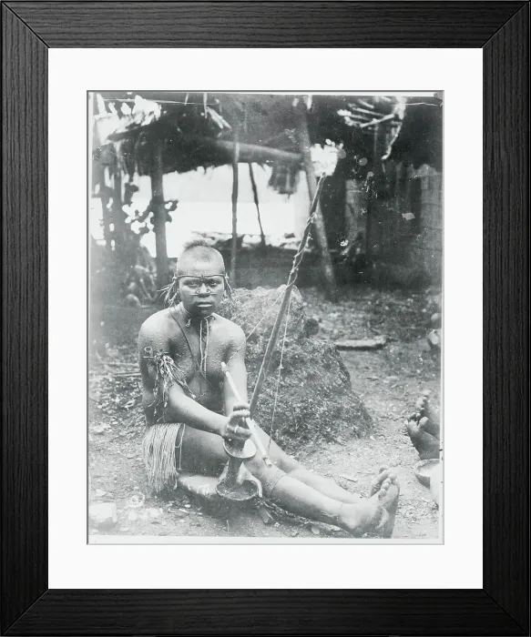 Framed Print : Solomon Islander Drilling Shells
