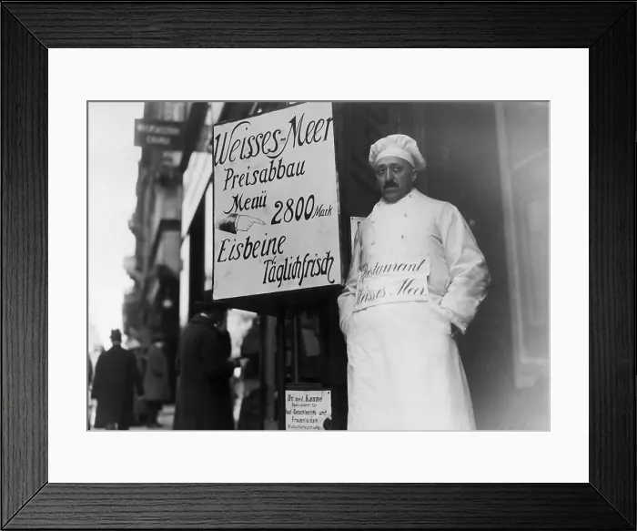 Framed Print : Chef Stands In Door By Restaurant Sign Framed Print : Chef Stands In Door By Restaurant Sign