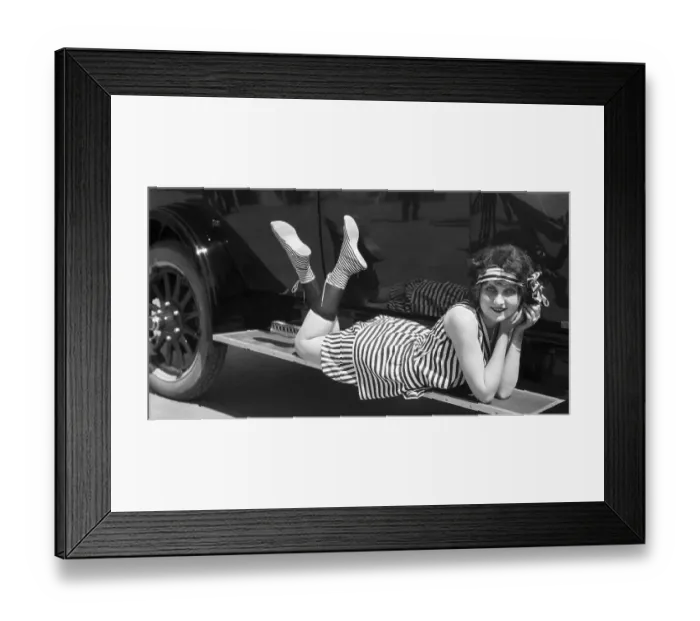 Framed Print : Young Woman in Striped Bathing Suit Framed Print : Young Woman in Striped Bathing Suit