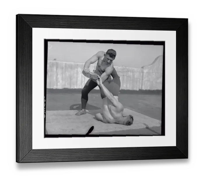 Framed Print : Ad Santel Wrestling with Opponent