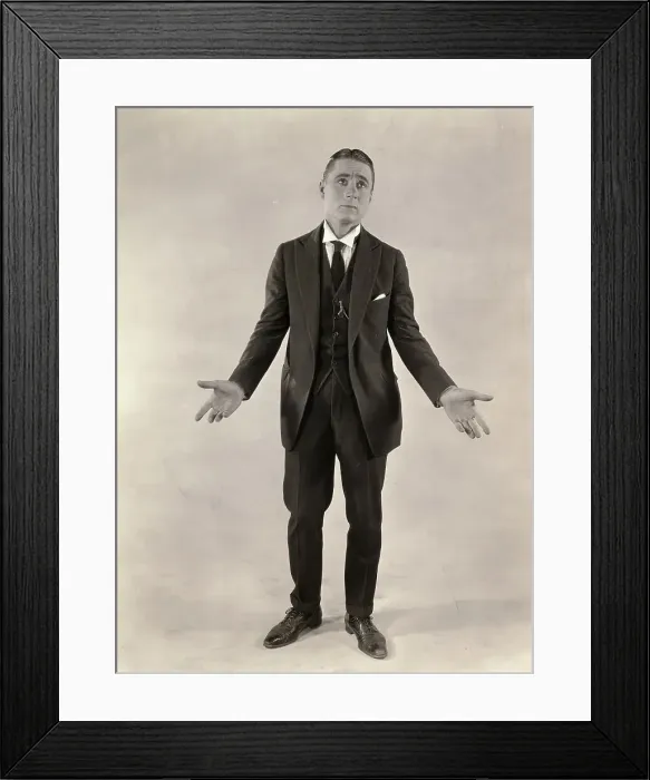 Framed Print : Syd Chaplin Looking Helpless