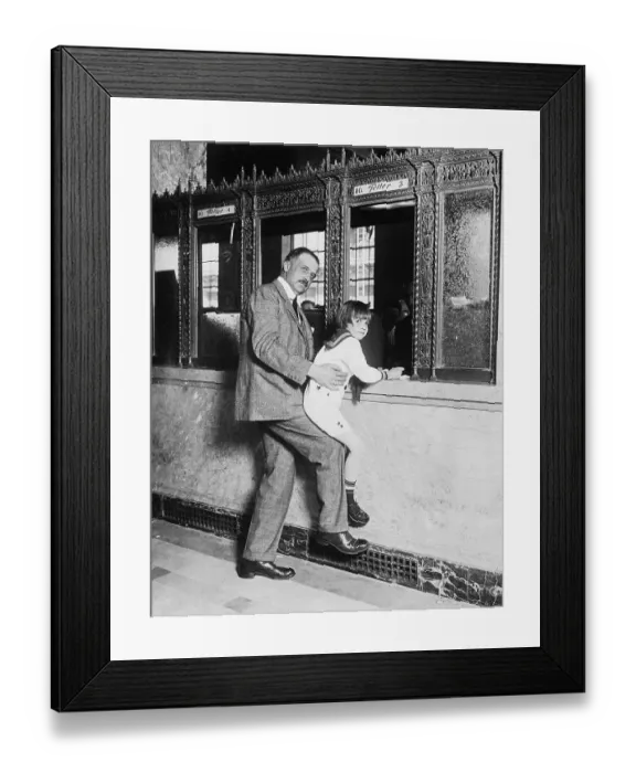 Framed Print : Amadeo Peter Giannini Lifting Jackie Coogan to Teller's Window Framed Print : Amadeo Peter Giannini Lifting Jackie Coogan to Teller's Window