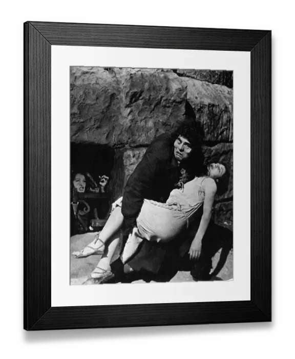 Framed Print : Lon Chaney as Quasimodo in Hunchback of Notre Dame carrying Esmeralda Framed Print : Lon Chaney as Quasimodo in Hunchback of Notre Dame carrying Esmeralda