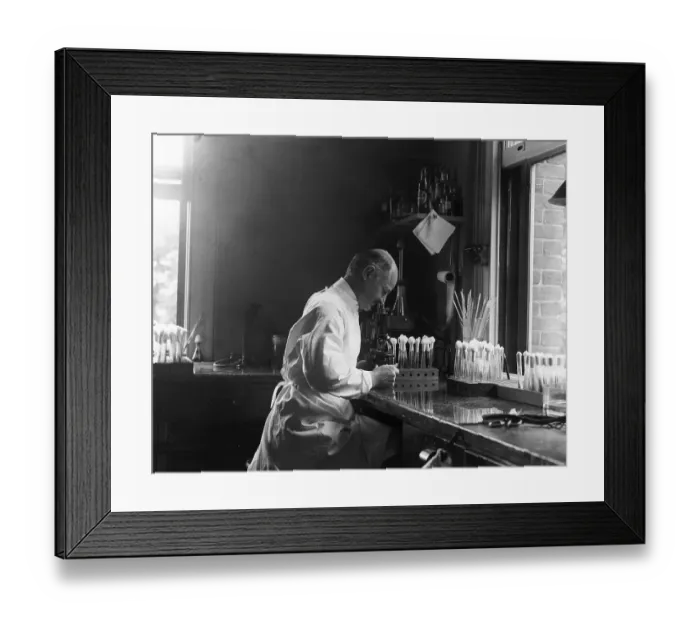 Framed Print : Doctor Looking Through Microscope Framed Print : Doctor Looking Through Microscope